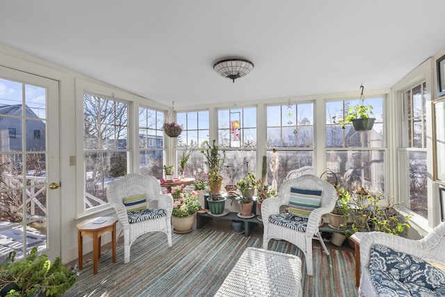 sunroom / solarium featuring a wealth of natural light