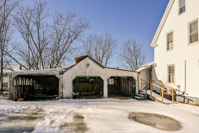 view of snow covered garage