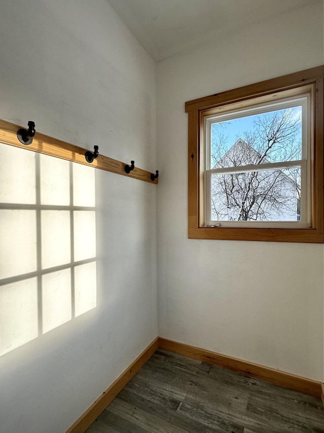 empty room featuring dark wood-type flooring