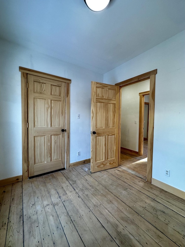 unfurnished bedroom featuring light hardwood / wood-style flooring