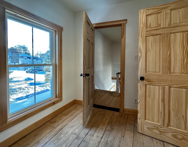 doorway to outside featuring light hardwood / wood-style flooring