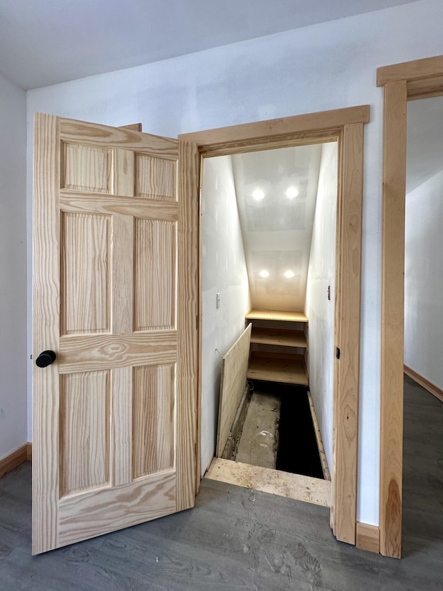 stairway with wood-type flooring