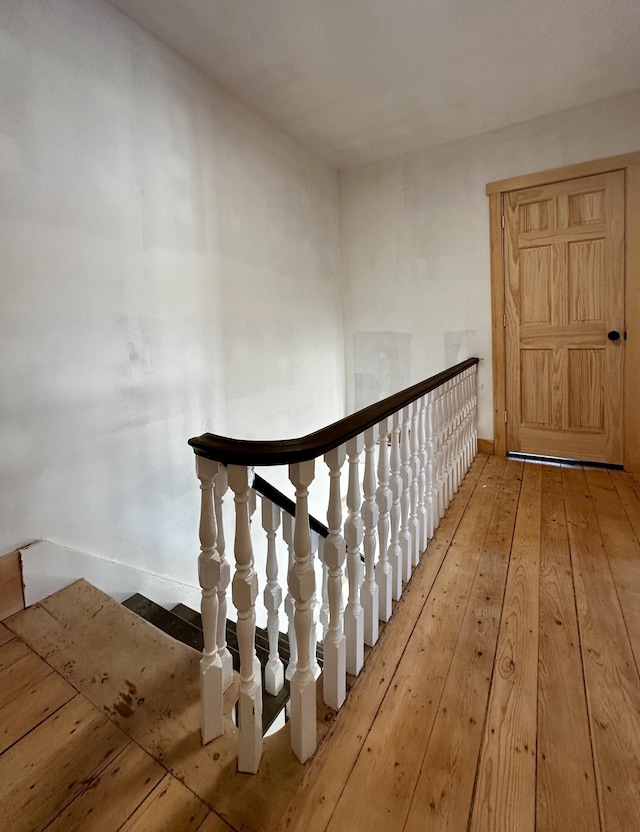 hallway featuring hardwood / wood-style floors