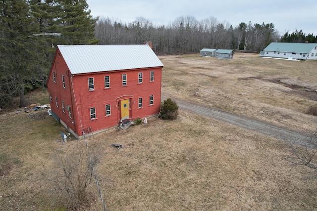 21 Talmadge Rd, Talmadge, ME 04492 - view from above of property with a heavily wooded area