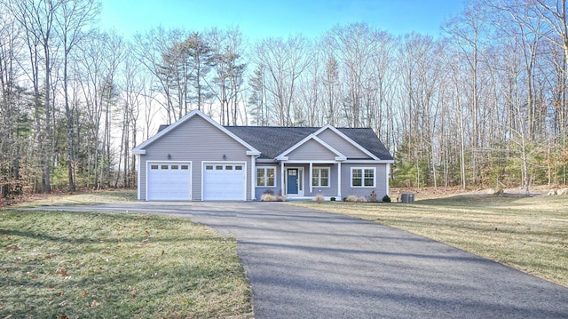 view of front of home with a front yard, a garage, and cooling unit