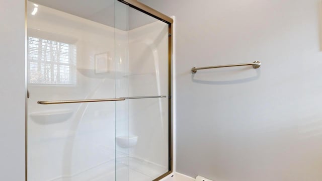 bathroom with an enclosed shower