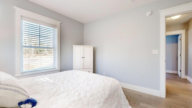 bedroom featuring light hardwood / wood-style floors