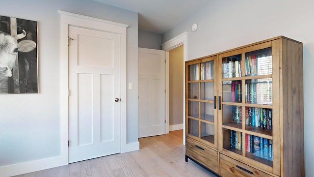 hallway featuring light wood-type flooring