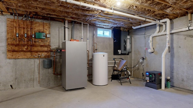 basement with electric panel, white fridge, and water heater