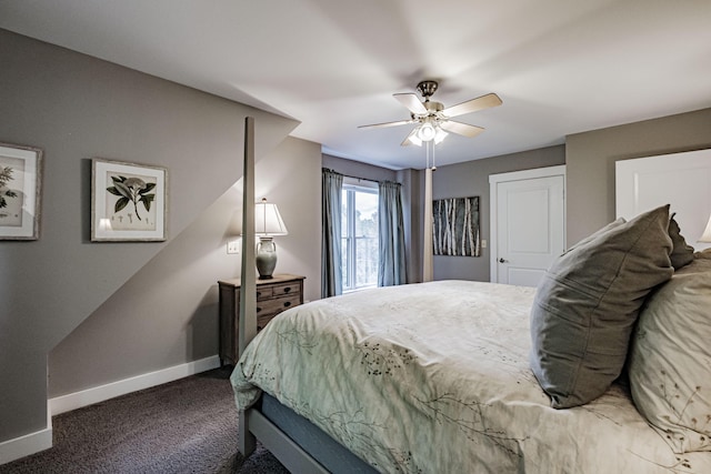 bedroom featuring ceiling fan and dark carpet