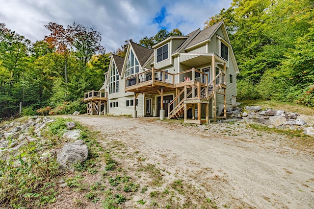 view of front of house featuring a wooden deck