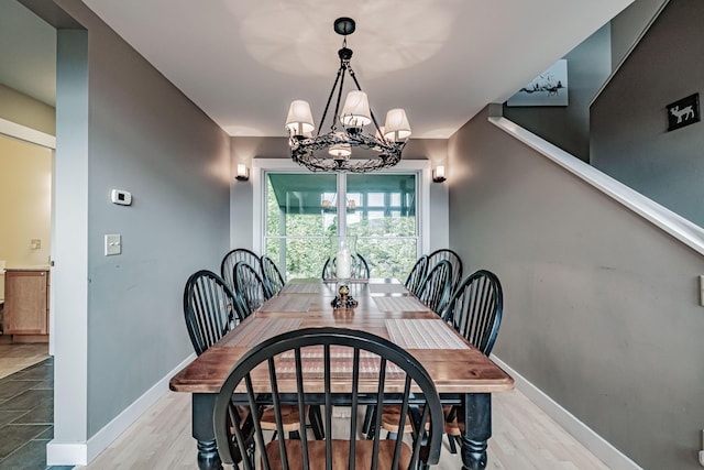 dining room featuring a chandelier