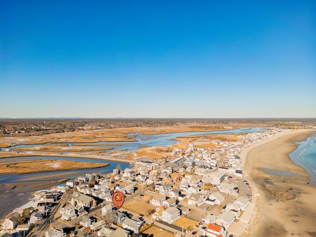 aerial view with a view of the beach and a water view