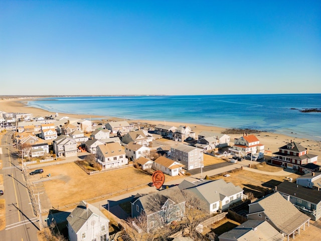 aerial view with a view of the beach and a water view