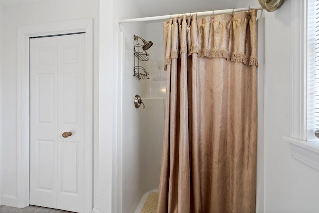 bathroom featuring walk in shower