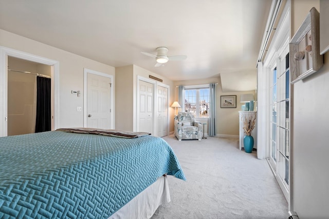 bedroom featuring ceiling fan and carpet