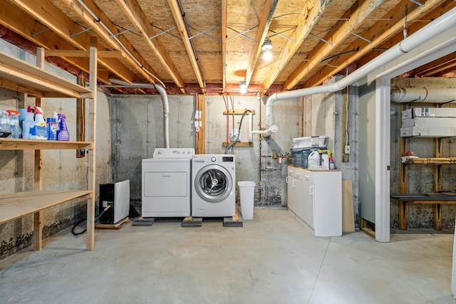 basement with washer and clothes dryer