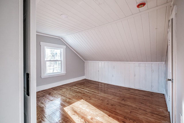 bonus room featuring hardwood / wood-style floors, lofted ceiling, and wood ceiling