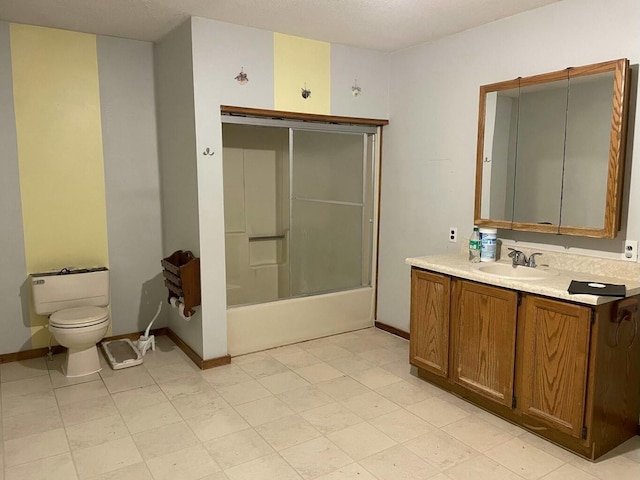 full bathroom featuring vanity, toilet, enclosed tub / shower combo, and a textured ceiling