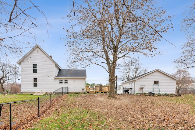 rear view of house with a deck