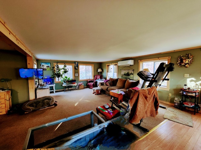 interior space featuring a wall mounted AC, hardwood / wood-style floors, and ornamental molding