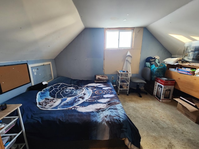 bedroom featuring carpet and vaulted ceiling