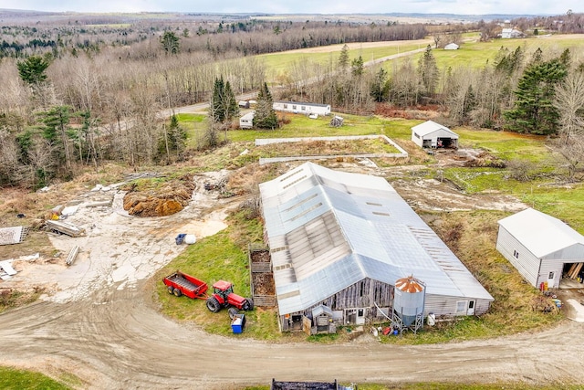 birds eye view of property featuring a rural view