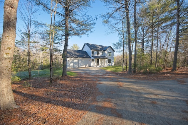 view of front of property with a garage