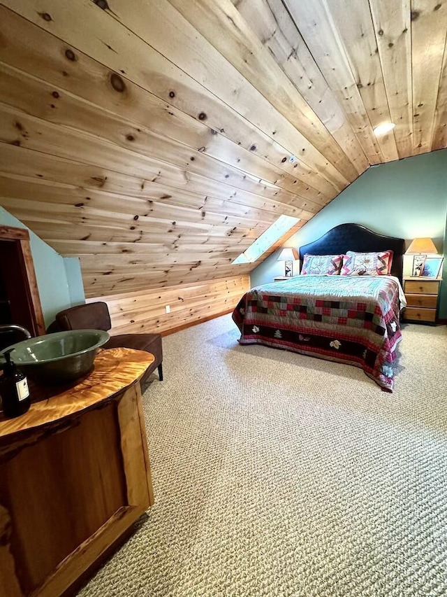 17-3 S Branch Way Unit 35, Sandy River Plt, ME 04970 - bedroom with carpet floors, wood ceiling, vaulted ceiling, and wooden walls