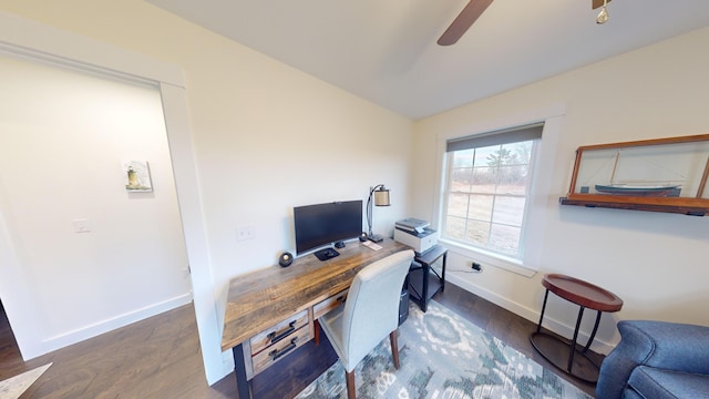 home office featuring ceiling fan, lofted ceiling, and dark wood-type flooring