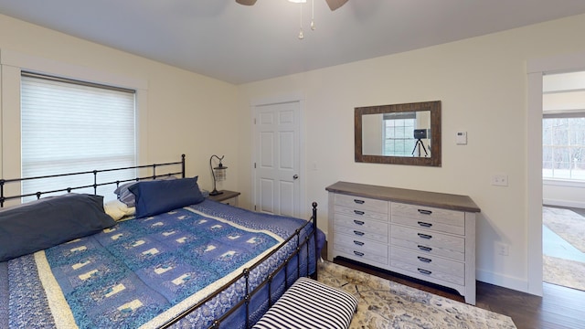 bedroom featuring hardwood / wood-style floors and ceiling fan