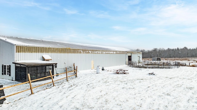 exterior space featuring an outbuilding and an exterior structure