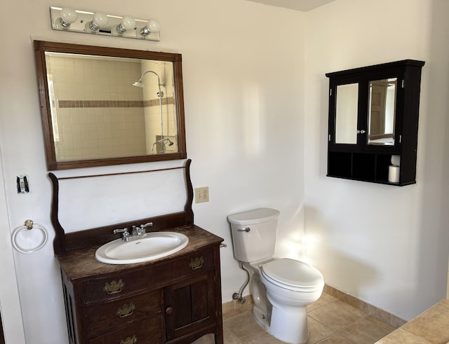 bathroom with tile patterned flooring, a shower, vanity, and toilet