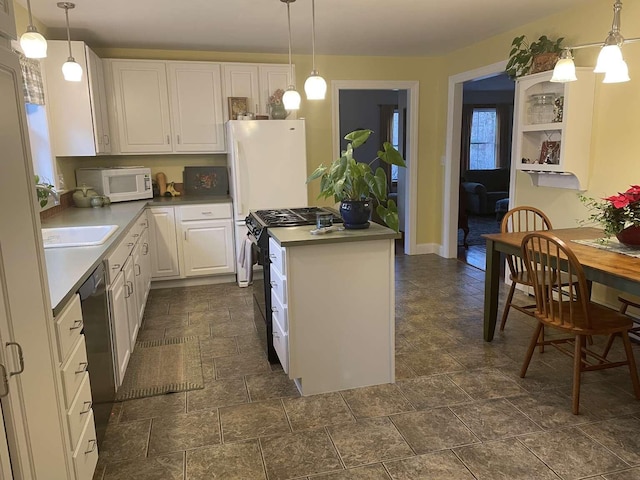 kitchen with dishwasher, black gas range oven, white cabinetry, and pendant lighting