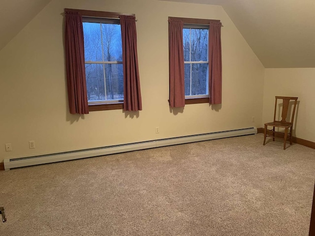 bonus room with baseboard heating, carpet flooring, and vaulted ceiling