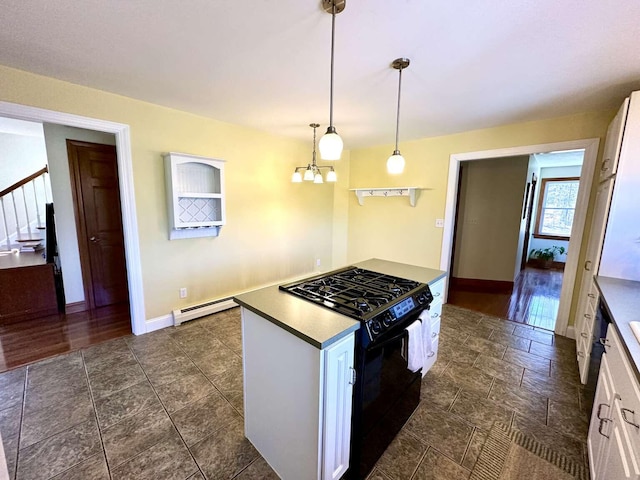 281 Danville Corner Rd, Auburn, ME 04210 - kitchen with a baseboard radiator, black range with gas cooktop, a notable chandelier, and white cabinets
