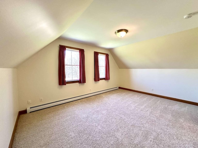 281 Danville Corner Rd, Auburn, ME 04210 - bonus room with vaulted ceiling, a baseboard heating unit, baseboards, and carpet