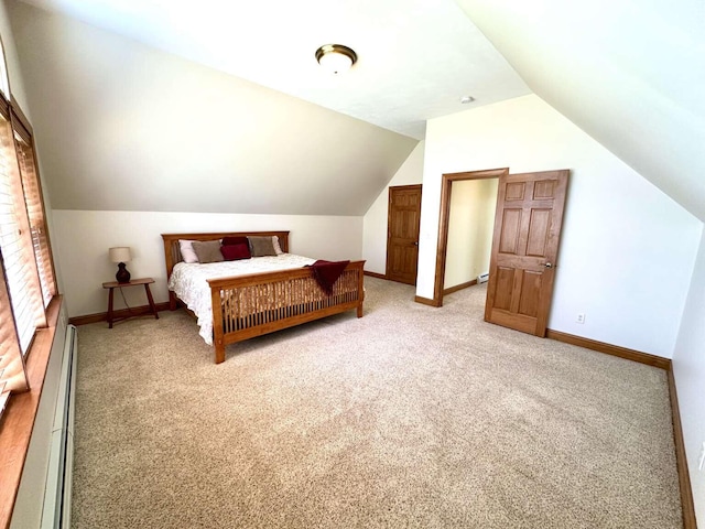281 Danville Corner Rd, Auburn, ME 04210 - bedroom with baseboards, vaulted ceiling, light carpet, and baseboard heating