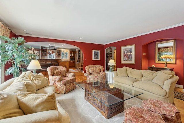 living room with crown molding