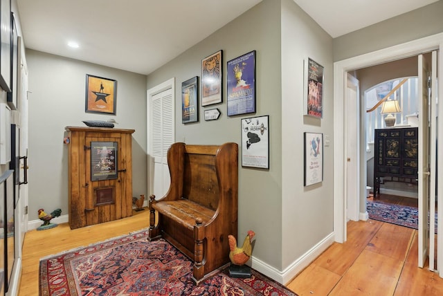 living area with light hardwood / wood-style flooring