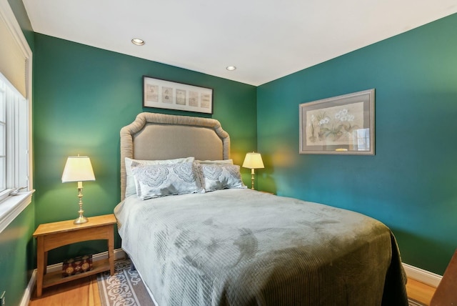 bedroom featuring hardwood / wood-style floors