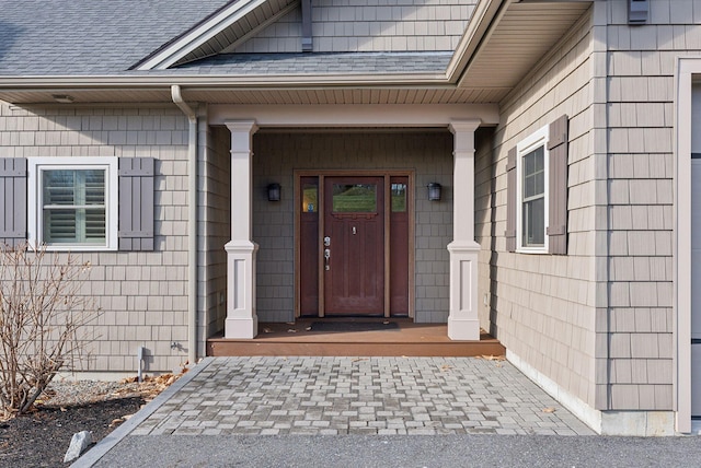 doorway to property with covered porch