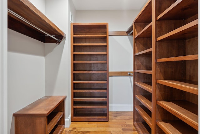 spacious closet featuring light wood-type flooring