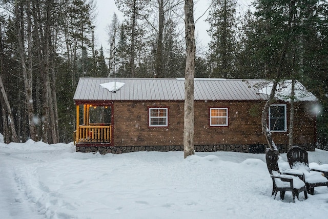 view of snow covered property