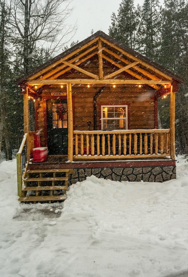 view of snow covered patio