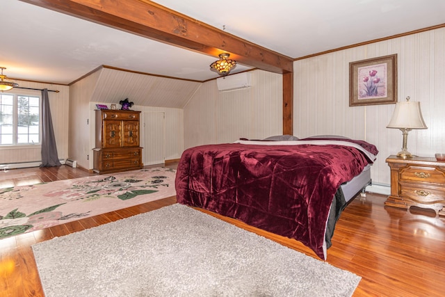 bedroom with baseboard heating, vaulted ceiling with beams, and hardwood / wood-style flooring