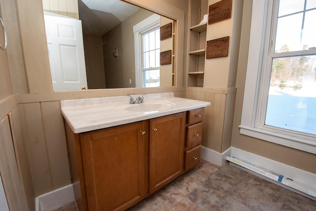 1153 Dexter Rd, Dover-Foxcroft, ME 04426 - bathroom featuring vanity and baseboard heating