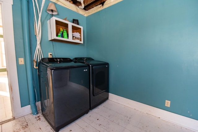 1153 Dexter Rd, Dover-Foxcroft, ME 04426 - laundry room featuring separate washer and dryer and baseboards