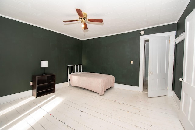 1153 Dexter Rd, Dover-Foxcroft, ME 04426 - bedroom with light wood-type flooring, crown molding, and a ceiling fan