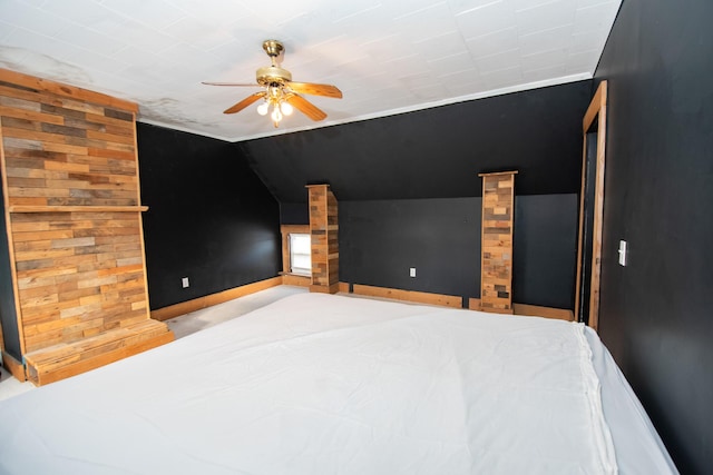 1153 Dexter Rd, Dover-Foxcroft, ME 04426 - unfurnished bedroom featuring lofted ceiling and a ceiling fan